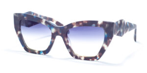 Ana Hickmann AH 9388 G21 sunglasses featuring oversized square frames with a distinctive tortoiseshell pattern in shades of blue and brown, complemented by blue gradient lenses and a stylishly twisted temple design.