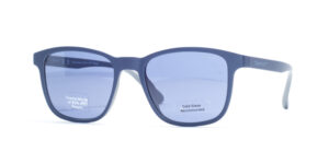 Gant GA 00006 92V sunglasses with matte blue rectangular frames, light blue lenses, and a note on the lens indicating that the frame is made of 85% PET plastic, with 'Cold Glaze Recommended