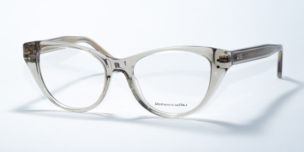 Rebecca Blu 7629 prescription glasses featuring a sophisticated cat-eye frame in a translucent taupe color. The design provides a subtle and elegant aesthetic, perfect for a chic and understated look. The RB logo is delicately placed on the temples, adding a touch of brand identity.