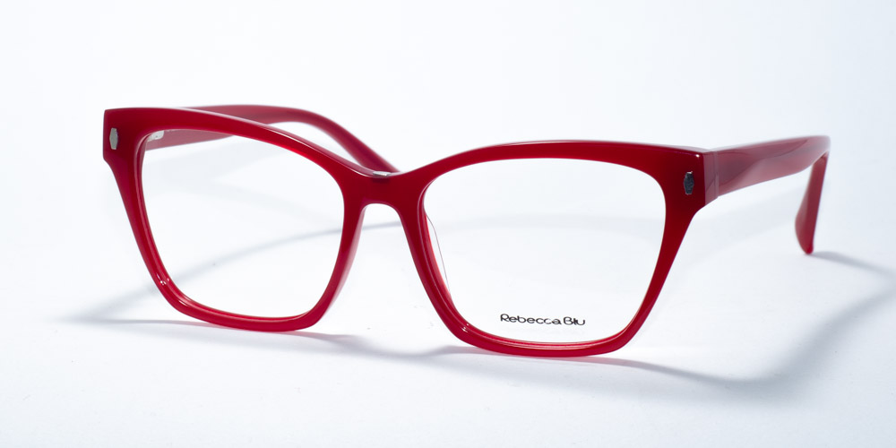 Rebecca Blu RB 7626 eyewear featuring a versatile square frame design, available in red and black. These glasses come with a detachable clip-on feature, offering a sleek and convenient option for sun protection. The sunglasses clip-on is gradient-shaded, adding a stylish contrast to the frame's solid colors. The frames also feature a small decorative accent on the temples, combining functionality with elegance.